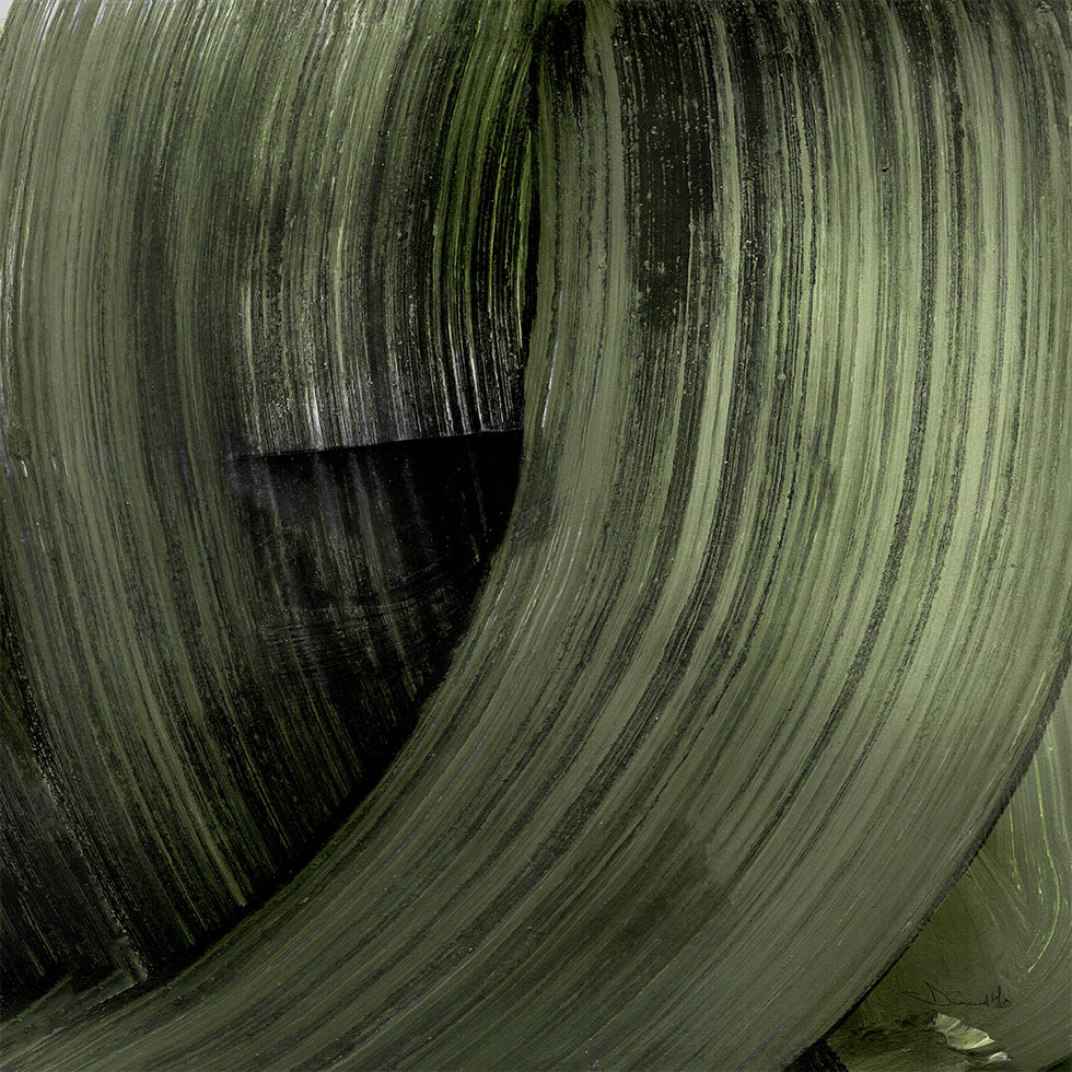 L'immagine è un primo piano di una superficie strutturata di colore verde con uno schema ripetuto di linee e curve verticali.