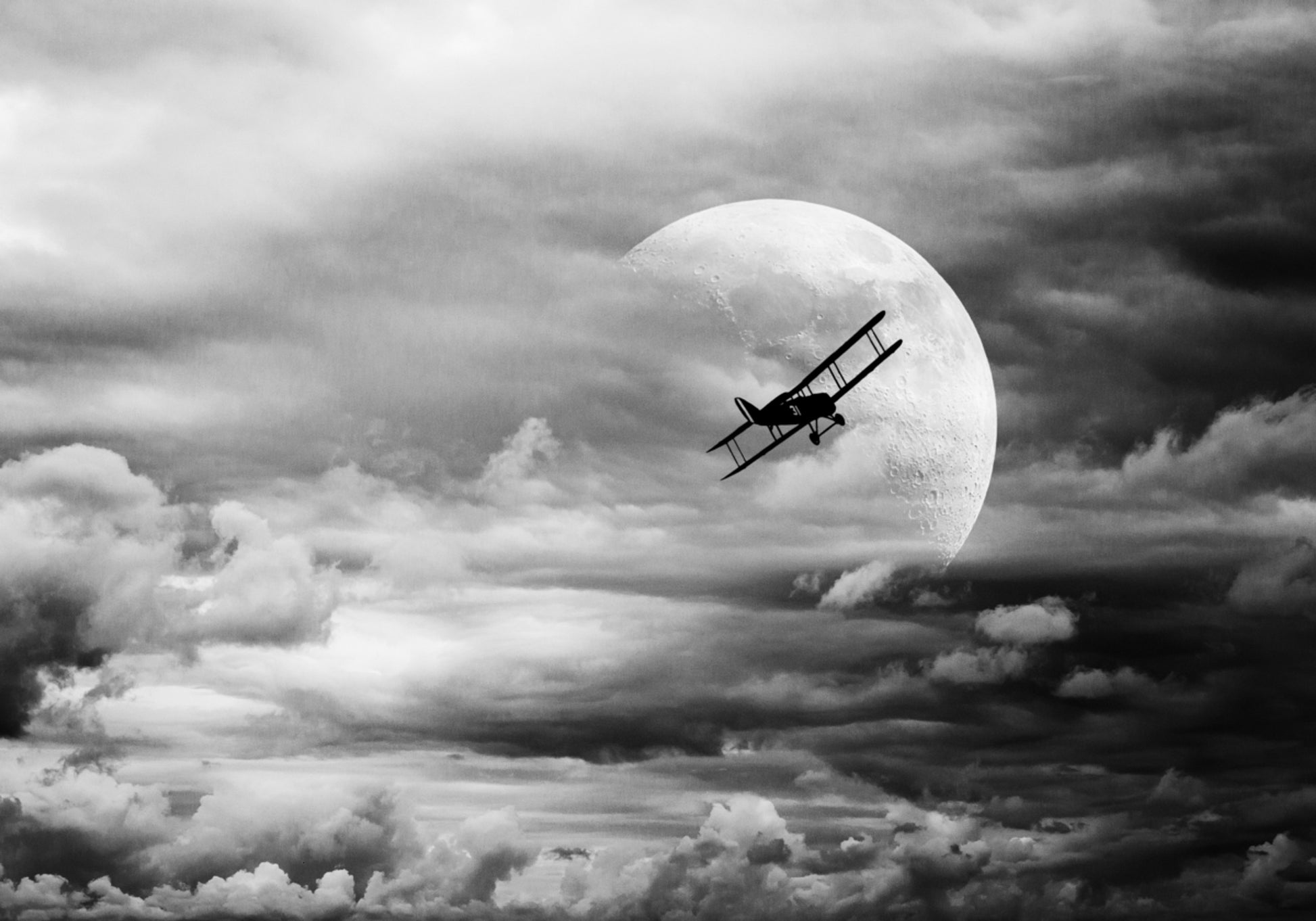 Volo sulla Luna in biplano